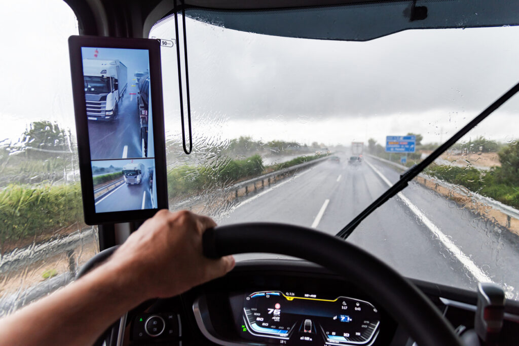 View from the driver's seat of a truck on a highway under heavy rain that prevents good visibility. - Fleet Witness - Fleet Tracking View from the driver's seat of a truck on a highway under heavy rain that prevents good visibility.