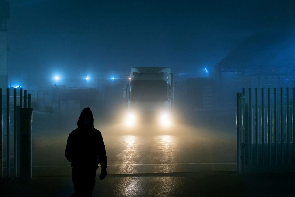 Burglar attempting to steal items in a truck