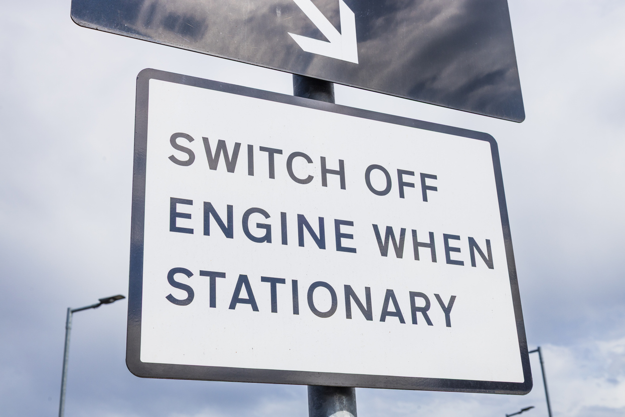 Close up sign reads Switch Off Engine When Stationary. Anti idling message for clean air, emissions reduction, fuel saving, and driver awareness in urban traffic. London, UK, 7 July 2024